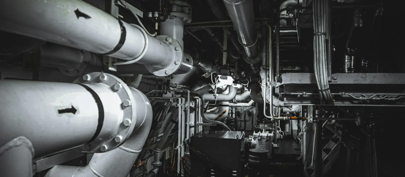 Pipework and machinery in a ship's engine room
