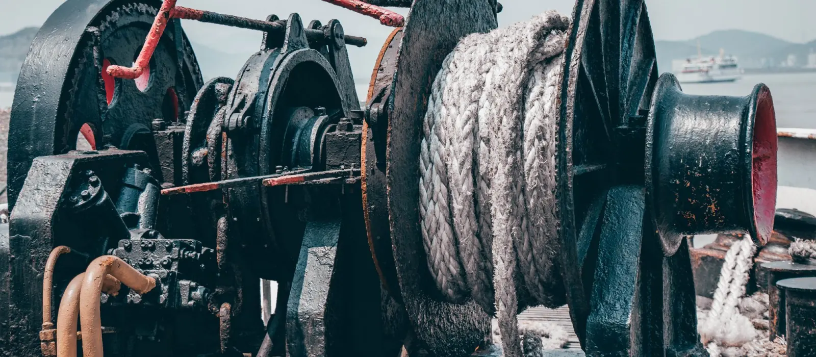 A mooring winch with its rope on a ship's deck