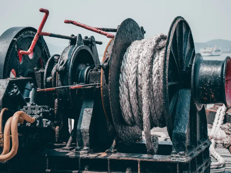 A mooring winch with its rope on a ship's deck